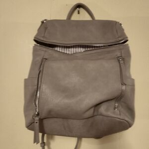 Miztrique, Light Grey Backpack with multiple Compartments and multiple straps.